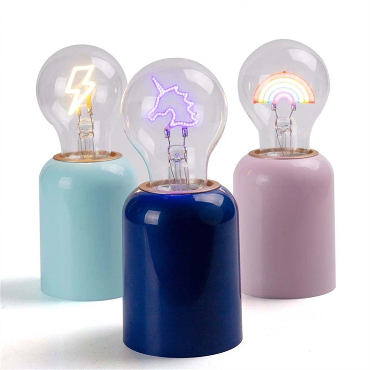 Whimsical Decorative LED Bulbs - Transparent Glass & Colorful Filament Design